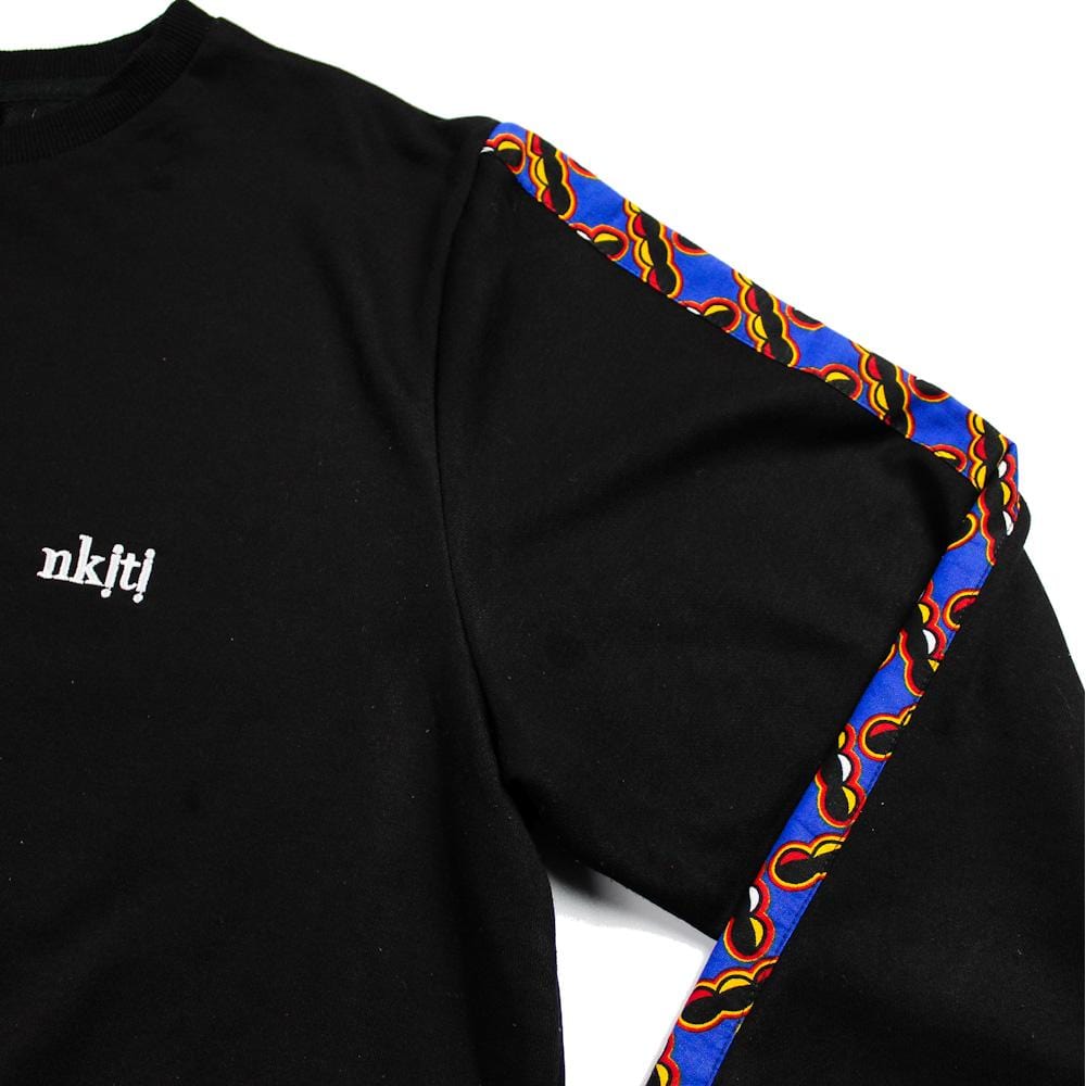 Jumper with African print sleeve detail