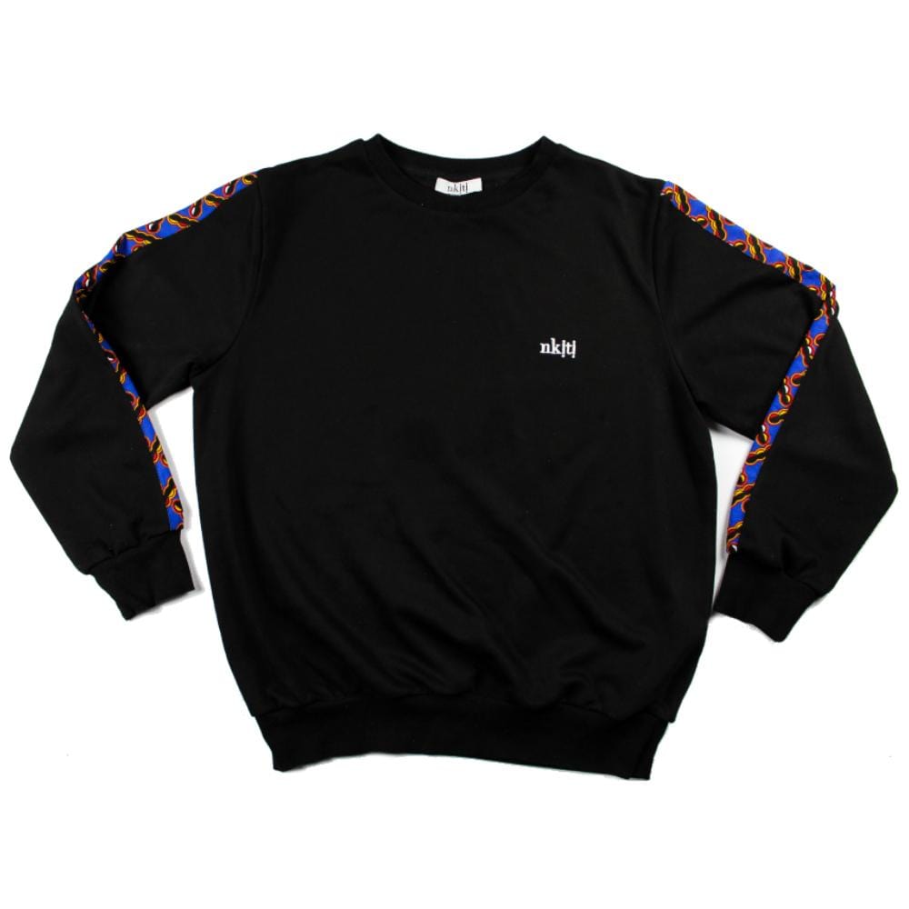 Jumper with African print sleeve