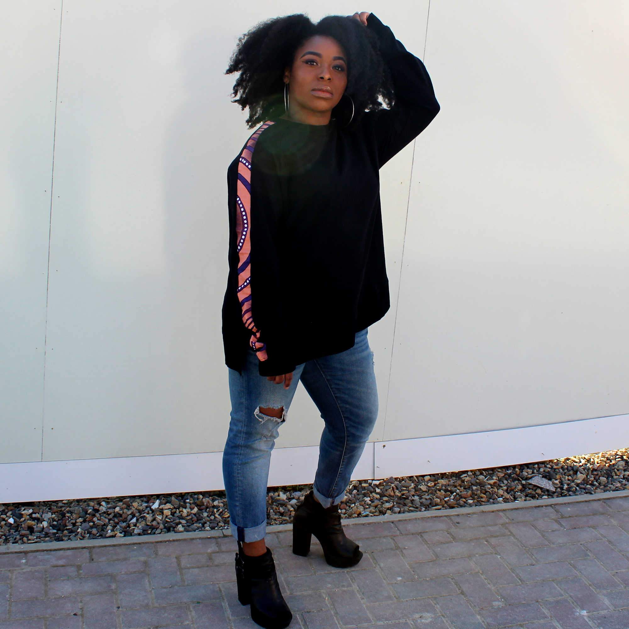 African print women's jumper special edition styled with heels and denim