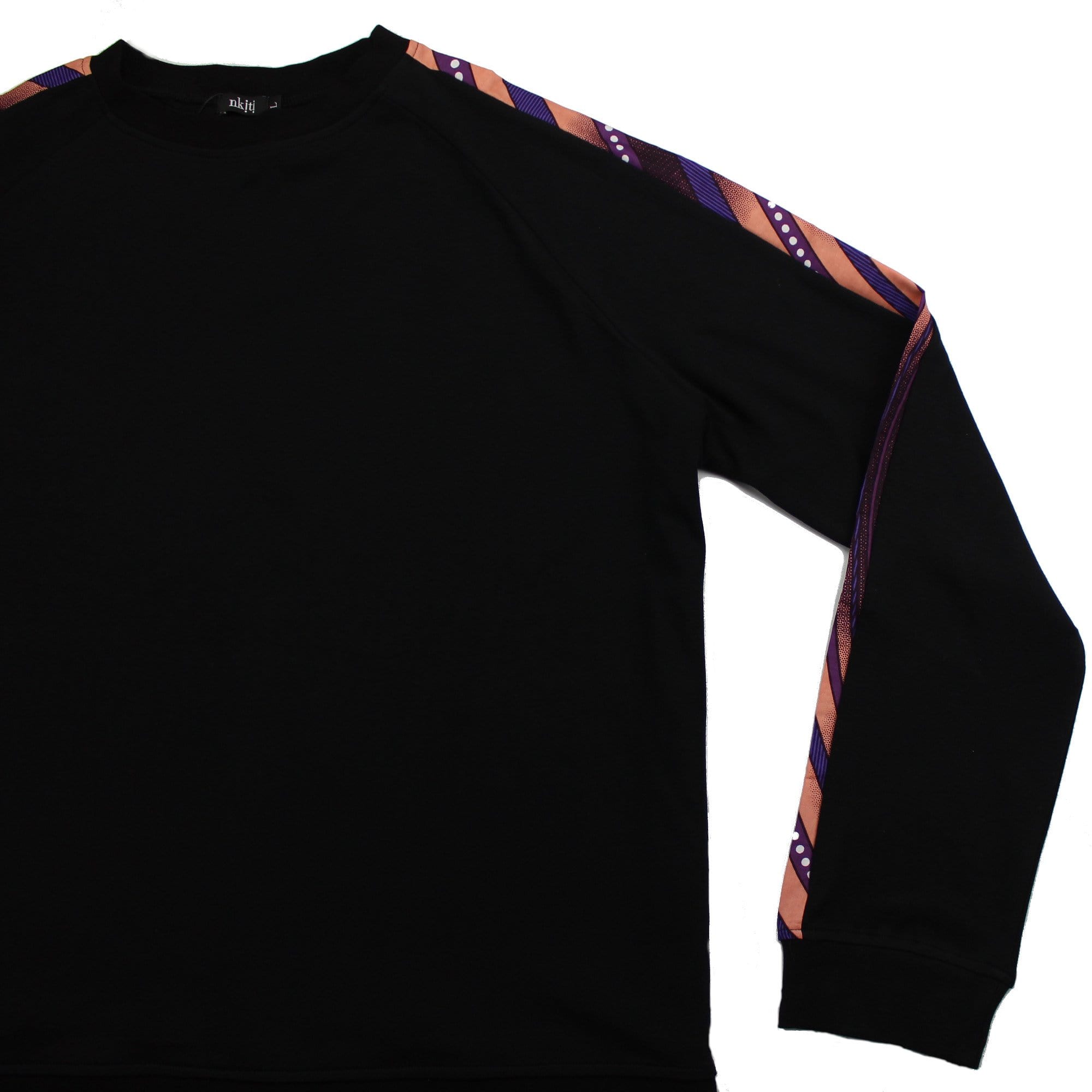 African Print Jumper flatlay with purple metallic ankara fabric detail