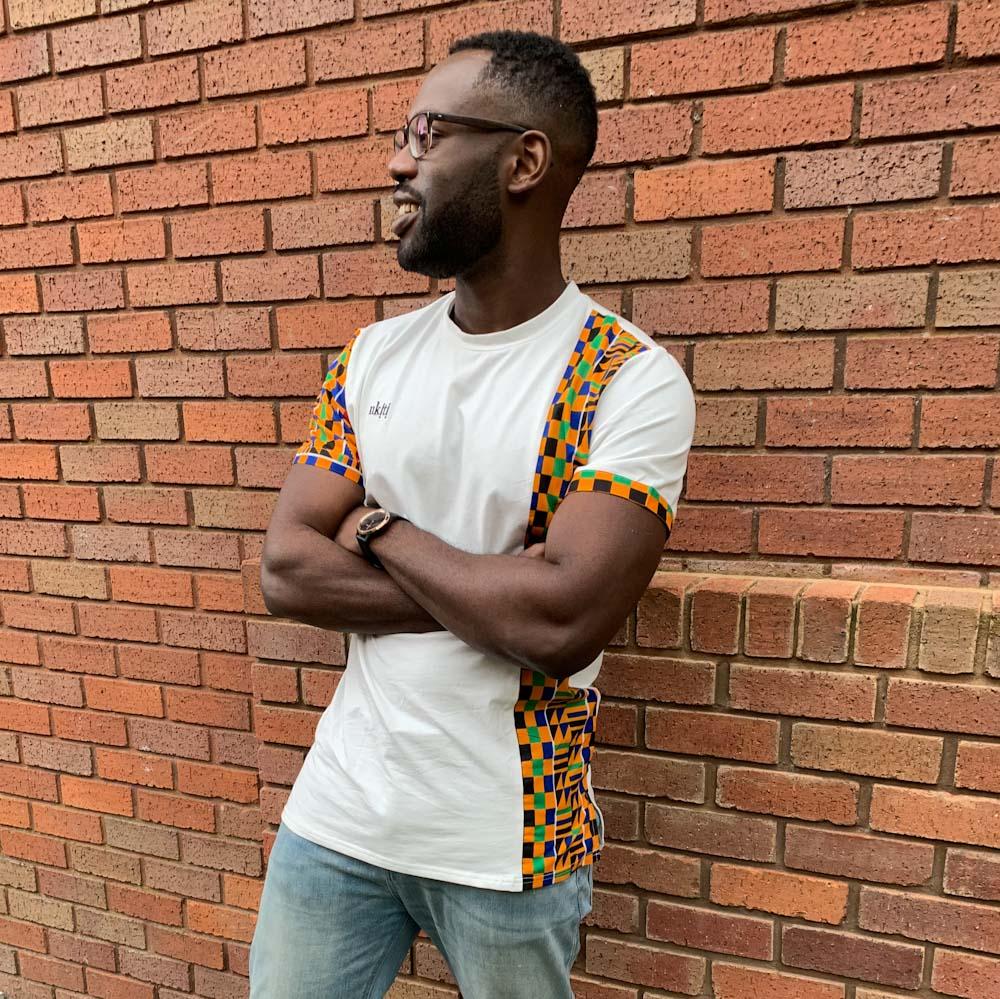 kente african print t-shirt panel in urban setting