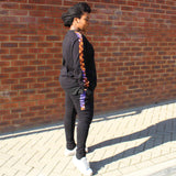 African print jumper and skinny joggers afro girl