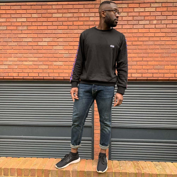 men's african print jumper with denim jeans look