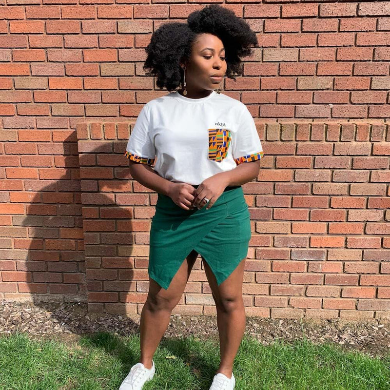 kente print t-shirt with pocket design and green skirt